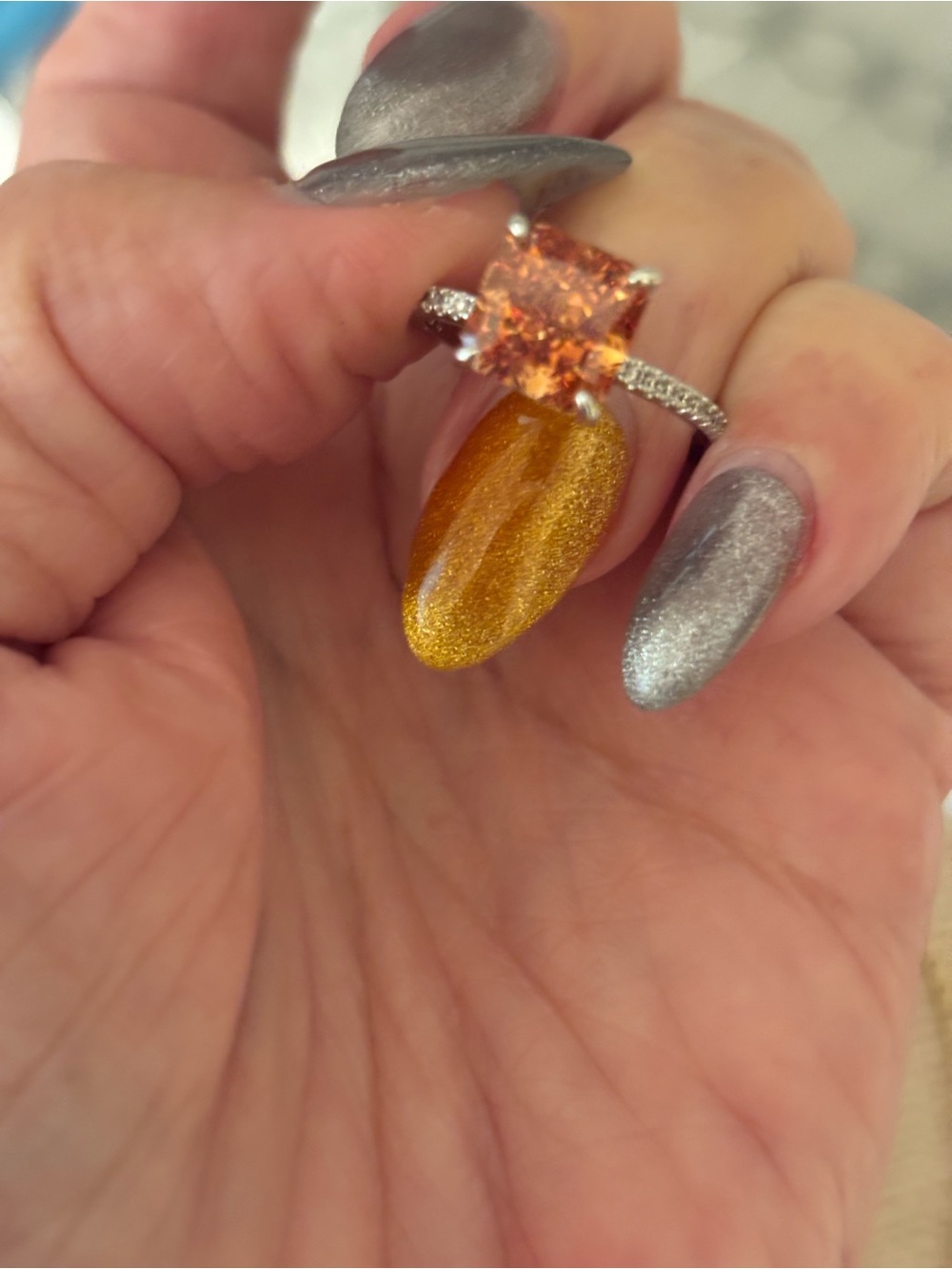 Elegant Orange-Center Silver Ring with Pavé Band